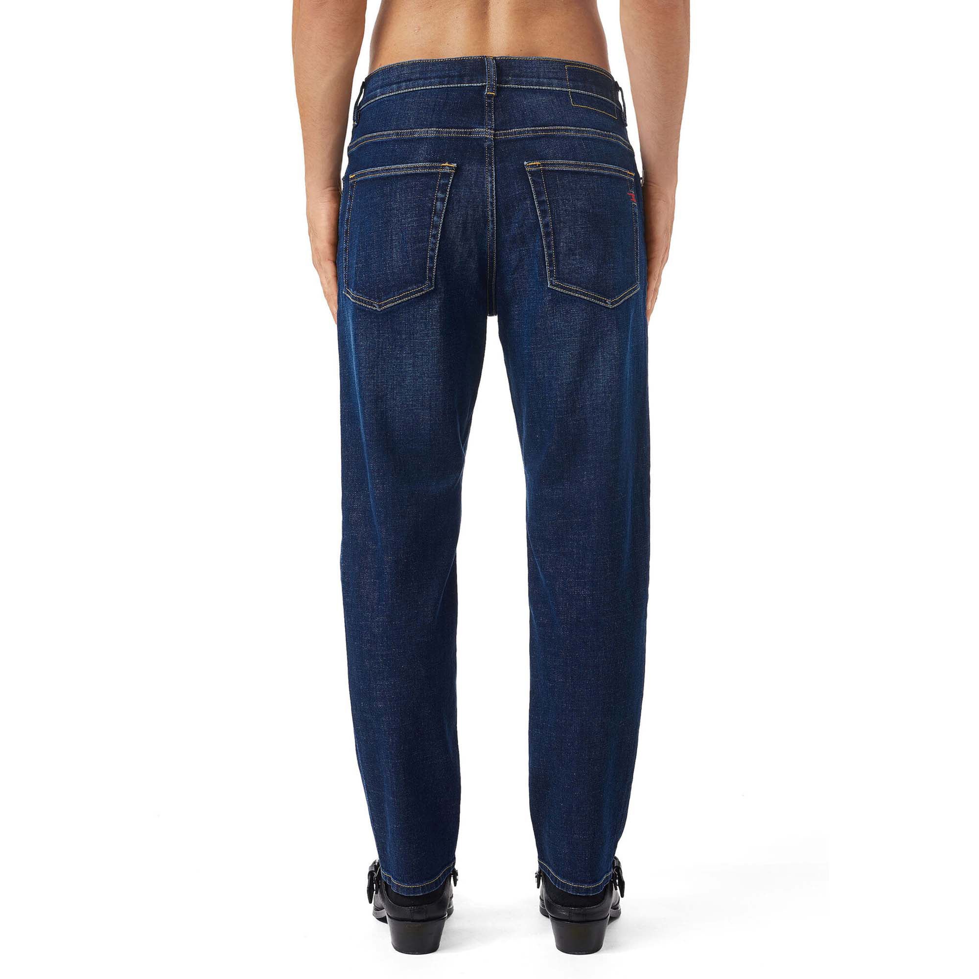 Rear view of Diesel D-Fining 09B90 Tapered Fit Jeans in Medium Blue