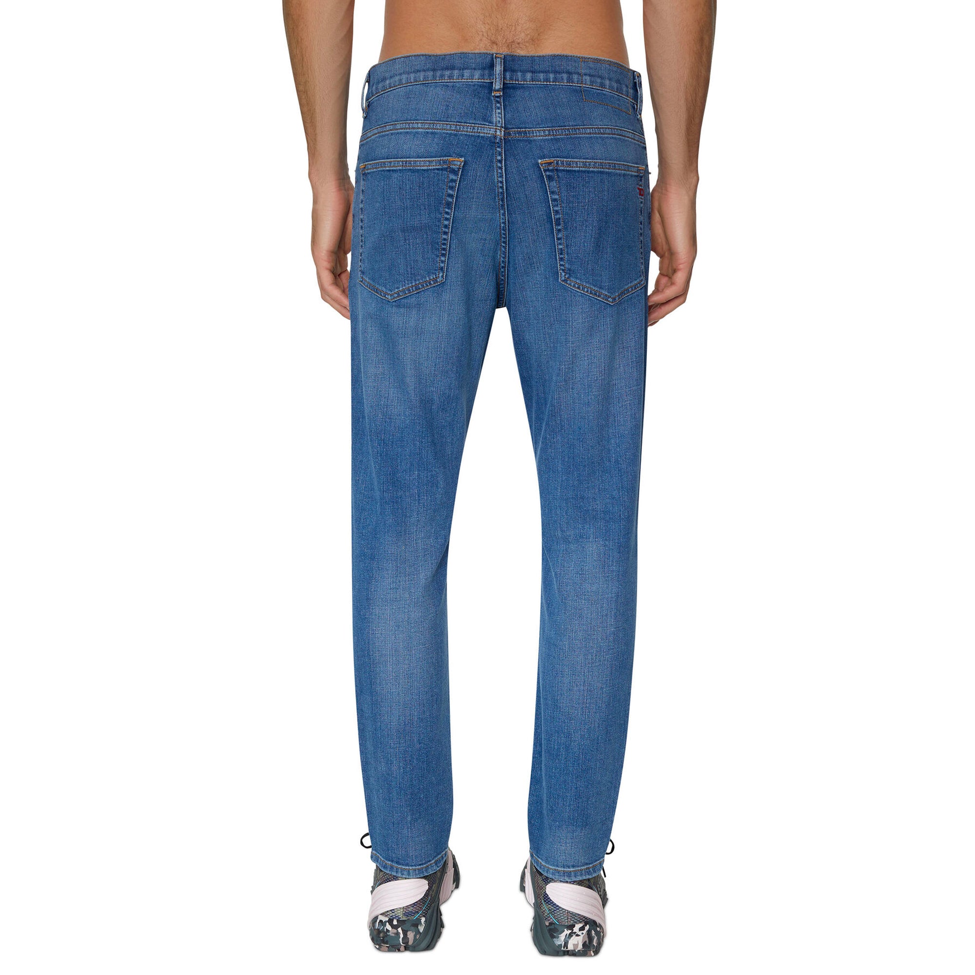 Rear view of Diesel D-Fining 09D47 Tapered Fit Jeans in Medium Blue