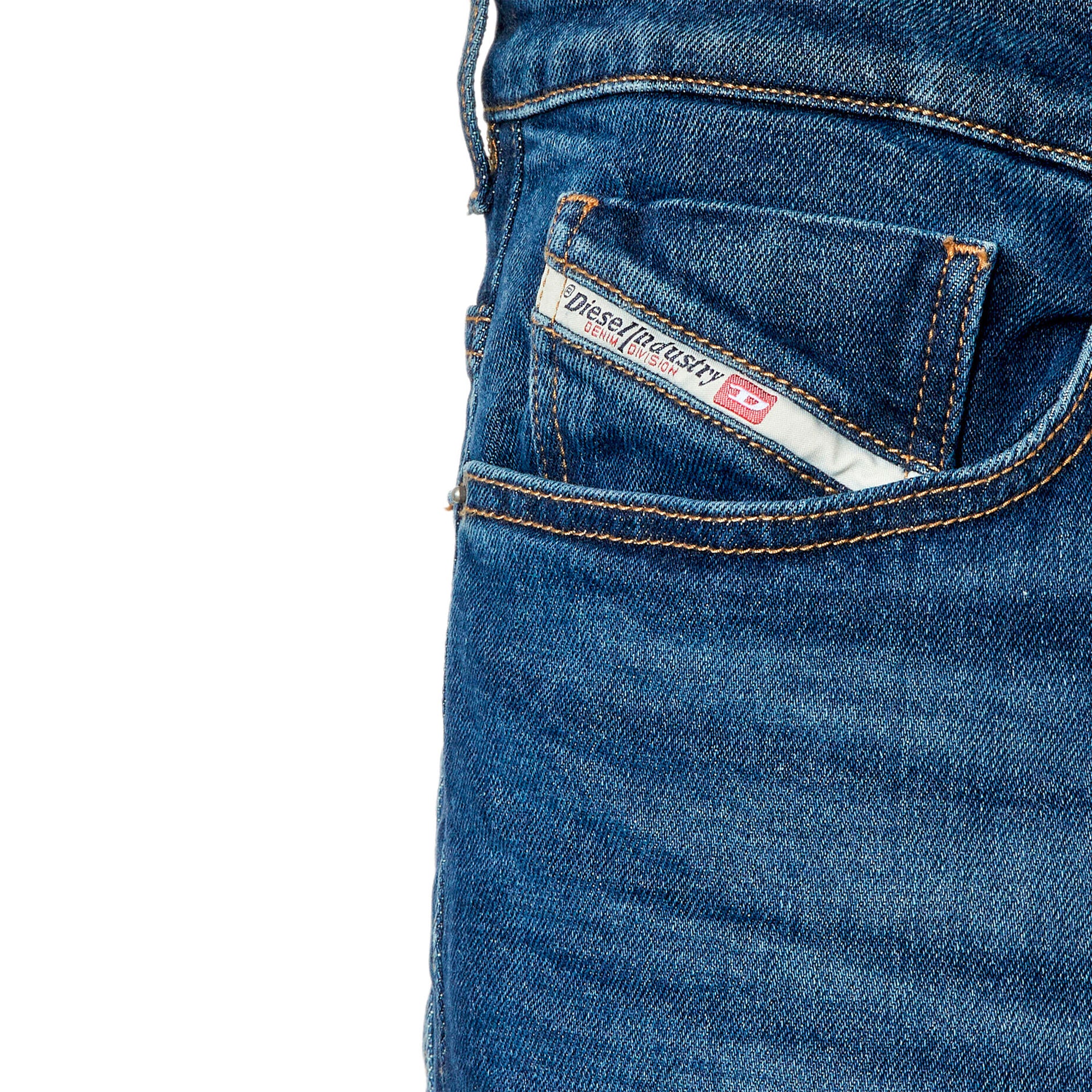 Close-up of coin pocket on Diesel D-Fining 0GYCS Tapered Fit Jeans in Medium Blue