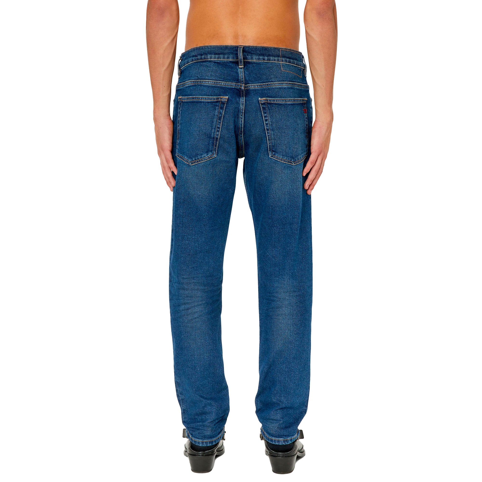 Rear view of Diesel D-Fining 0GYCS Tapered Fit Jeans in Medium Blue