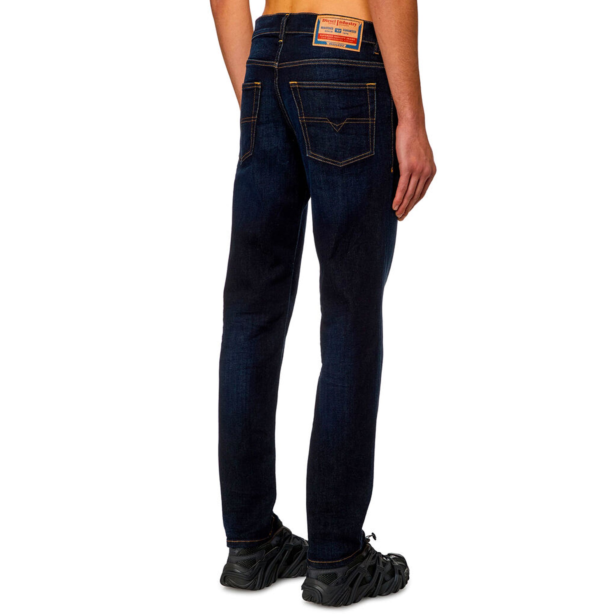 Rear view of Diesel D-Finitive 009ZS Tapered Fit Jean in Dark Blue