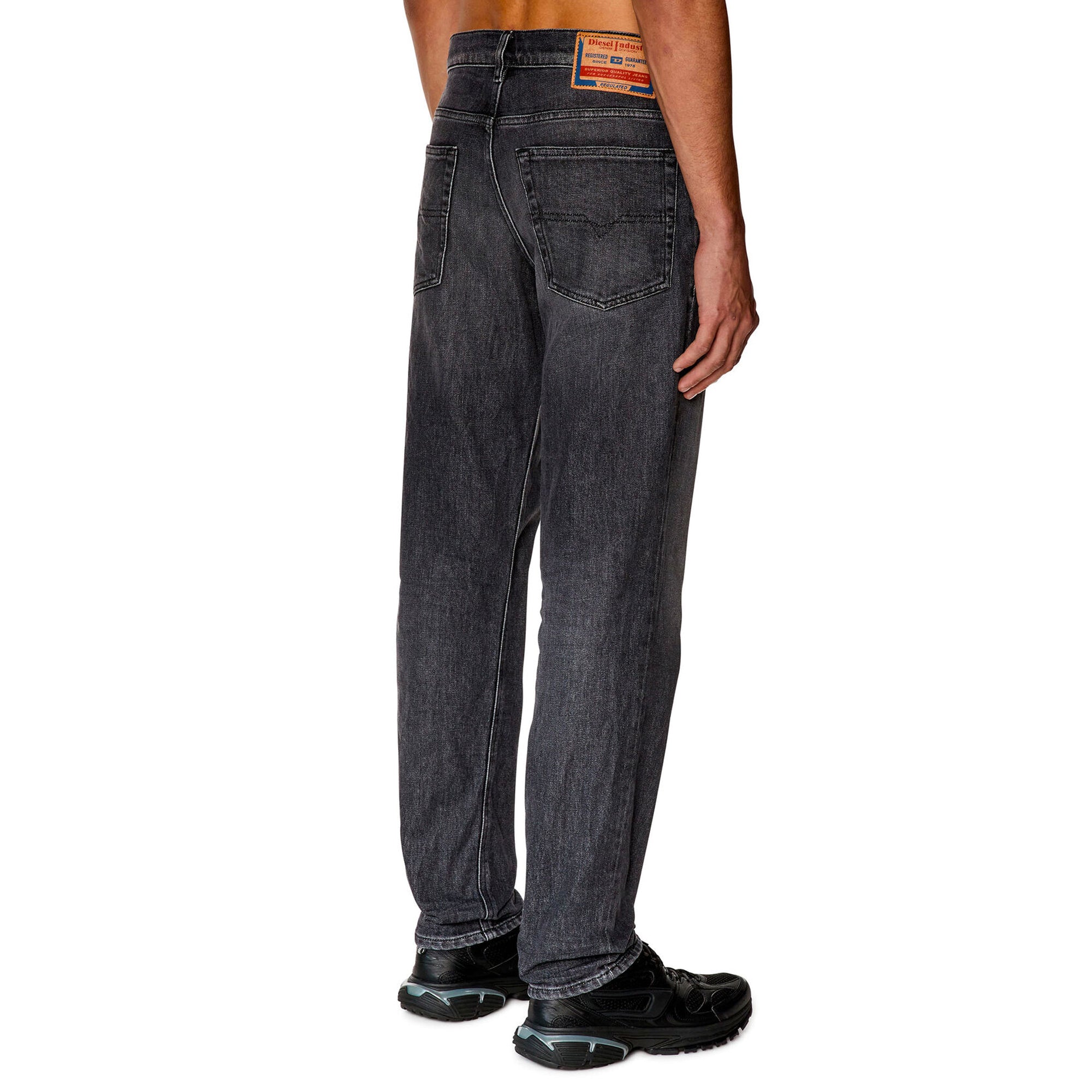 Rear view of Diesel D-Finitive 09F84 Tapered Fit Jeans in Mid Grey