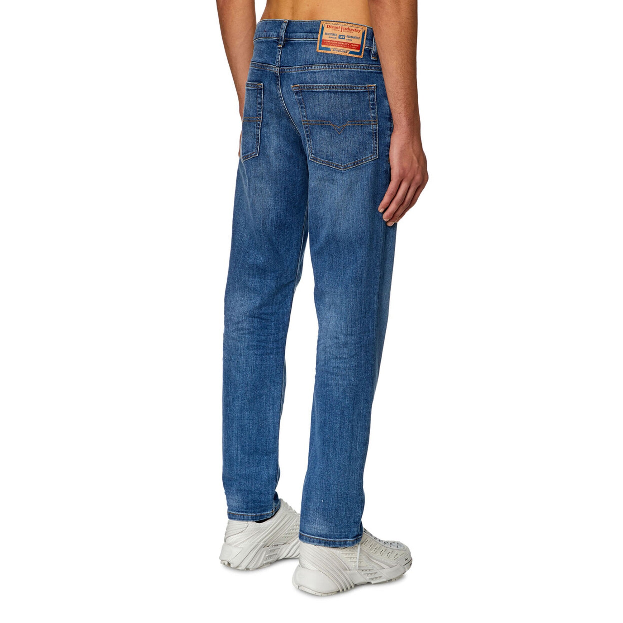 Rear view of Diesel D-Finitive 0KIAL Tapered Fit Jean in Light Blue