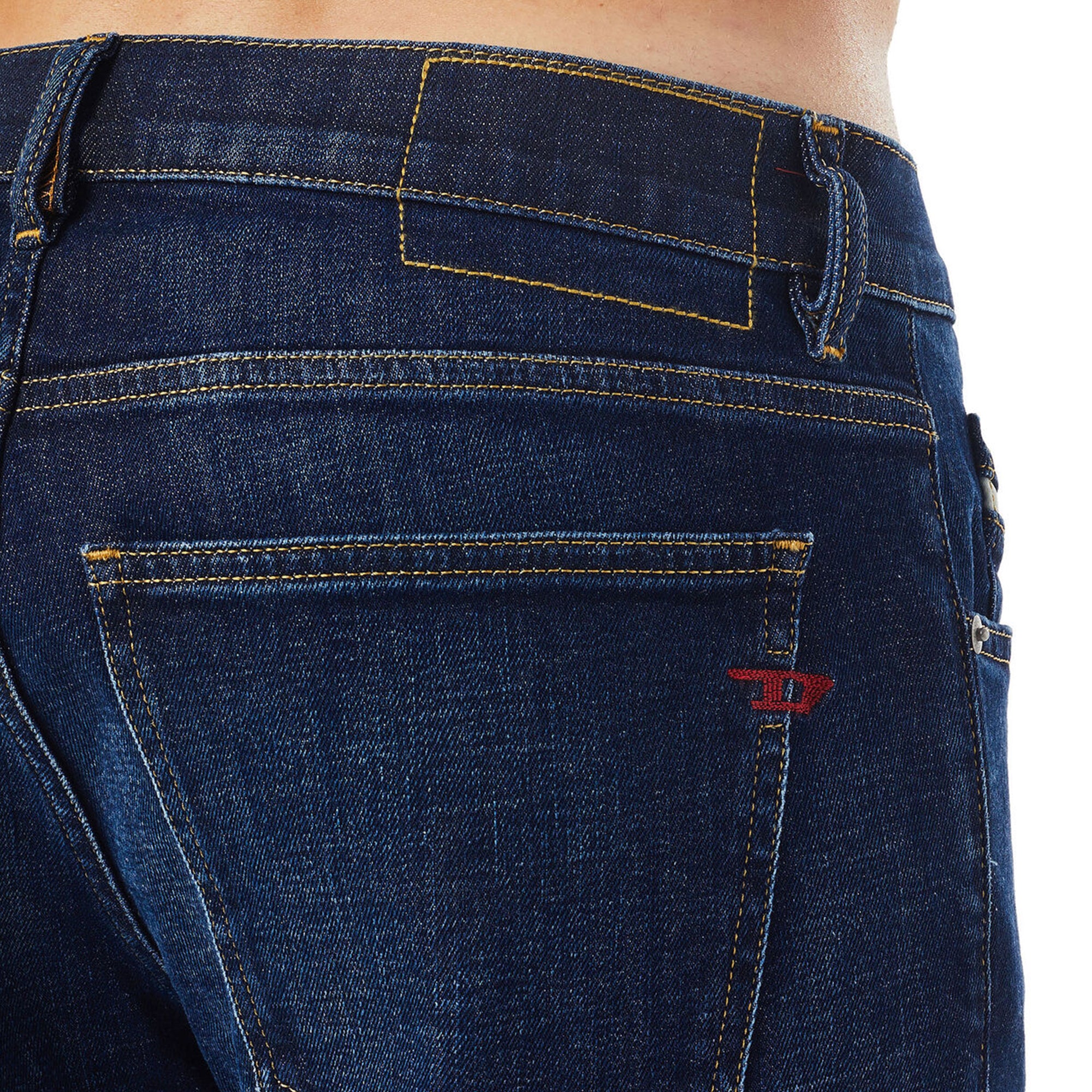 Close-up of waist on Diesel D-Strukt 09B90 Straight Fit Jeans in Medium Blue