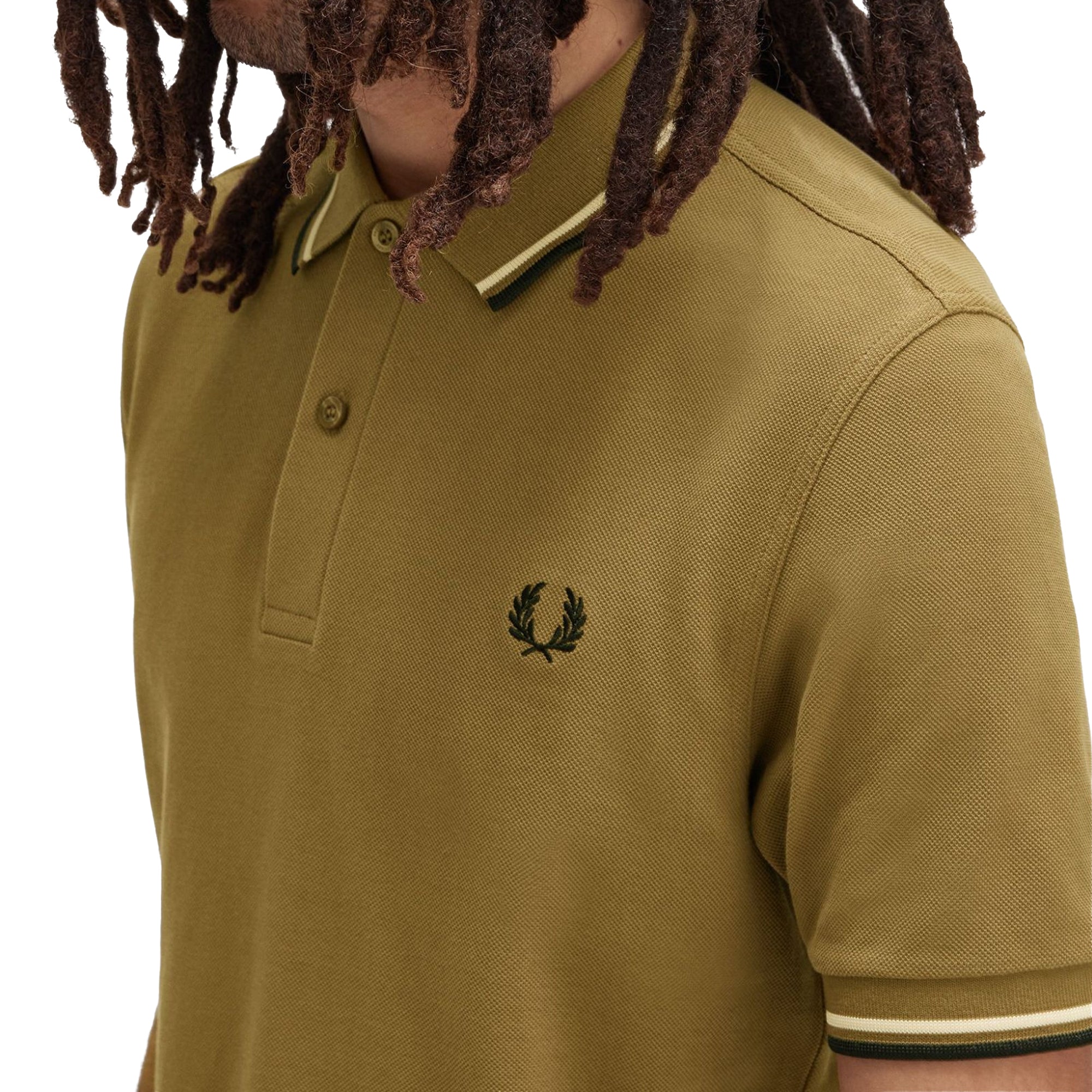 Close-up of Laurel Wreath embroidery on Fred Perry The Fred Perry Shirt for Men in Shaded Stone/Ice Cream/Black