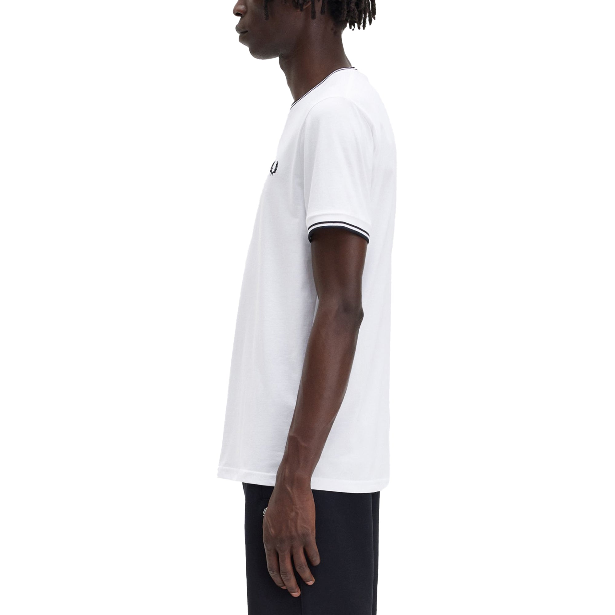 Side model shot of Fred Perry Twin Tipped T-Shirt for Men in White